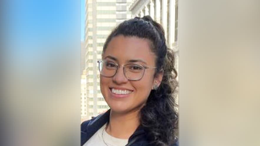   Maricela Abarca, Data Curator. Smiling female with glasses. 