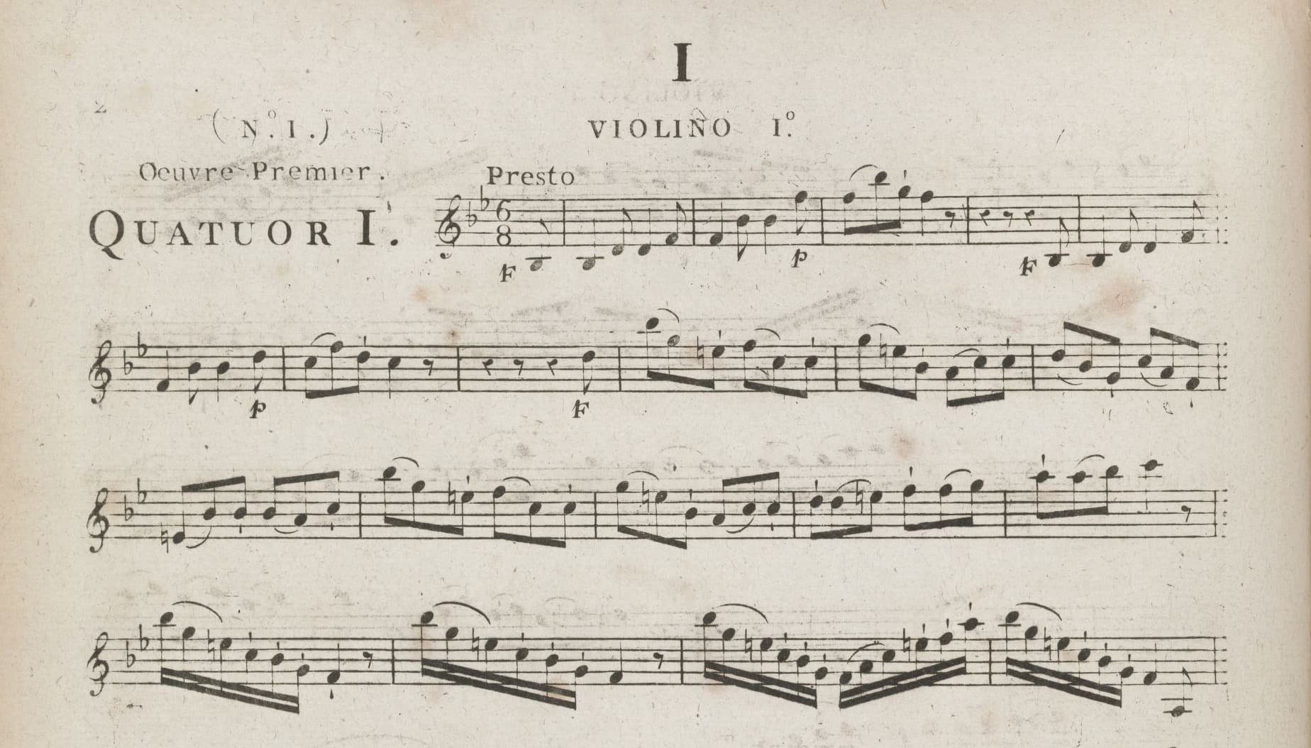 Old music score showing "I" centered at the top of the page and centered on the second line, "Violino I" 