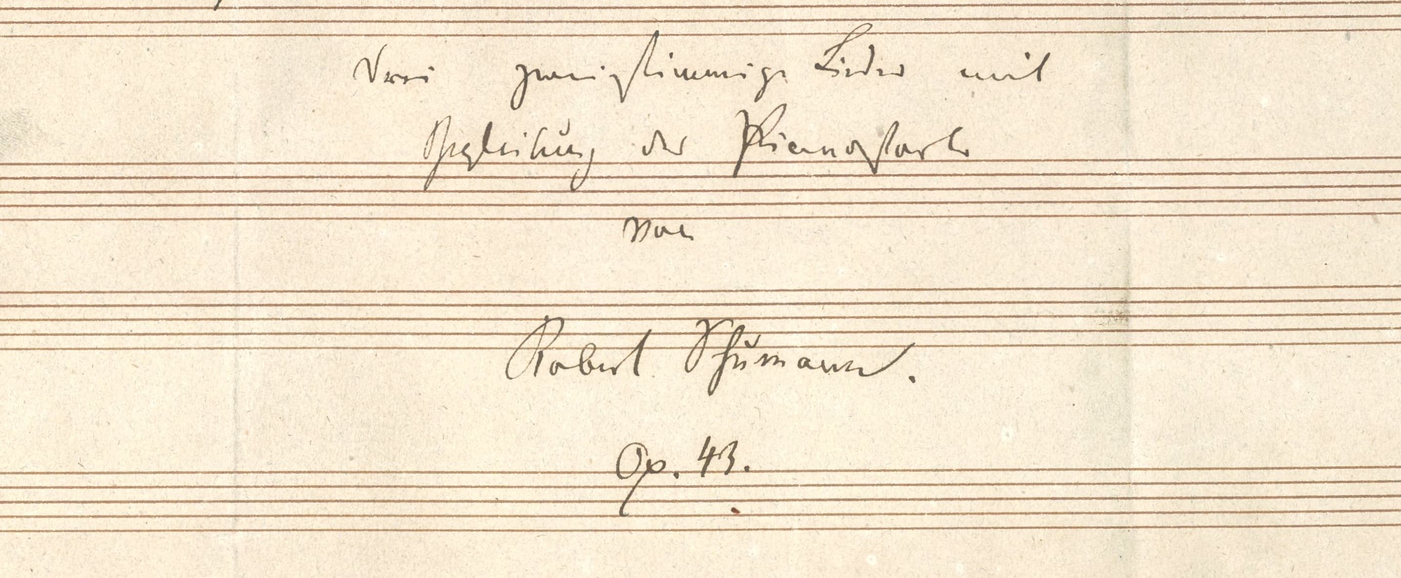 Manuscript title page with written German text followed by Schumann's signature and "Op. 43".