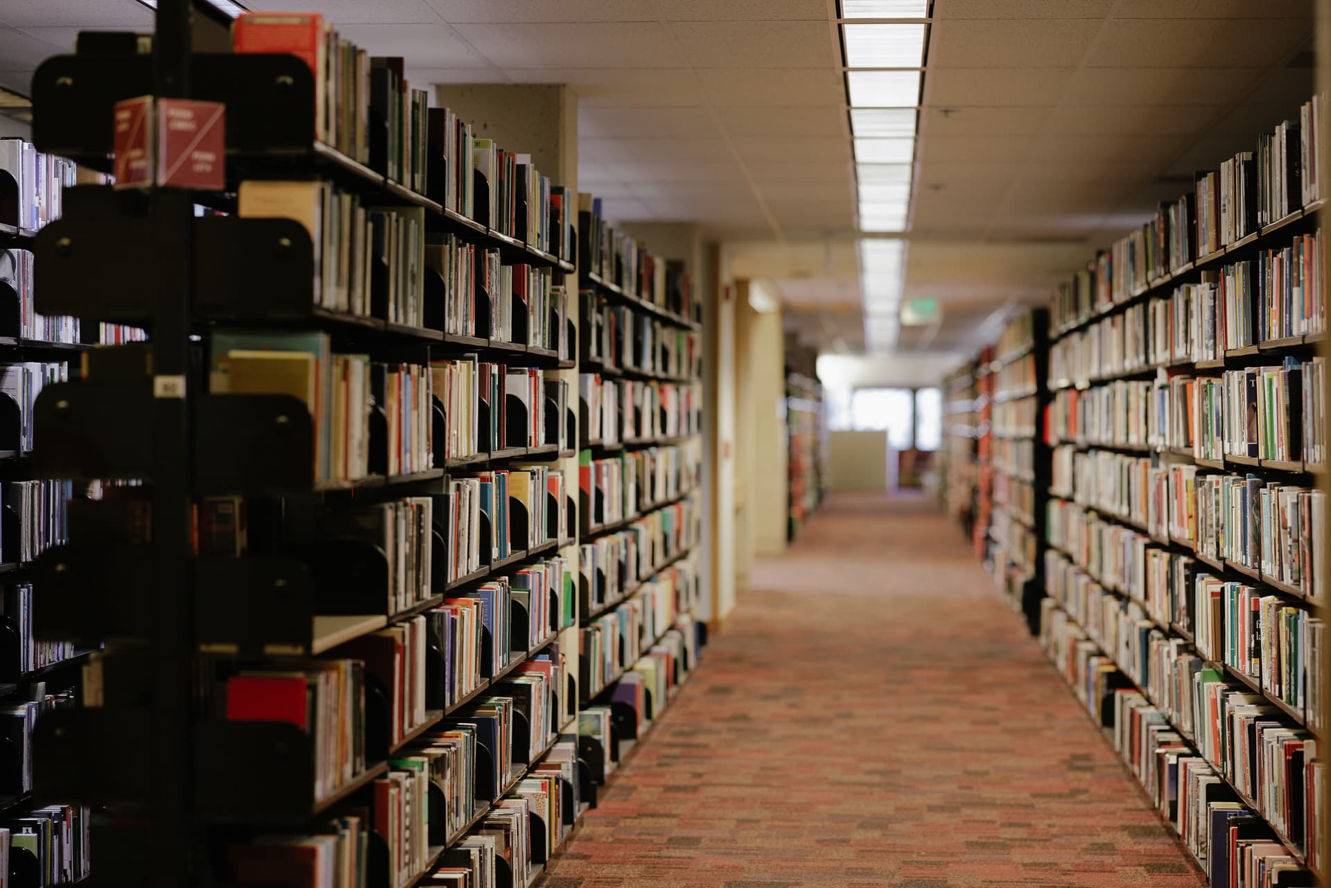 Range of books in the East Wing stacks area at Green Library.